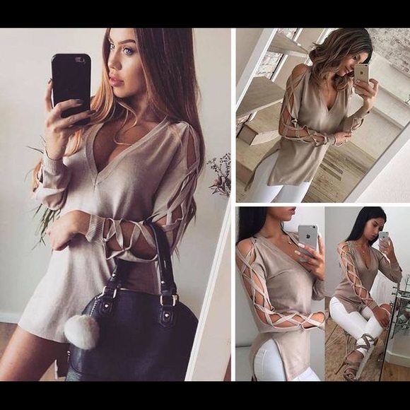 Criss cross sleeve sweater.