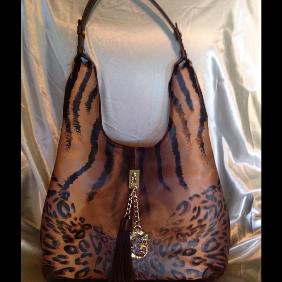 NWOT Browns and gold hardware Sharif leather bag.
