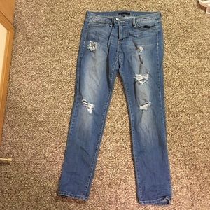 Ripped ankle skinny jeans