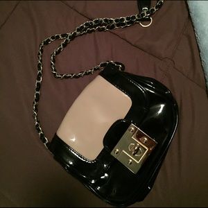 Black and nude shiny leather purse