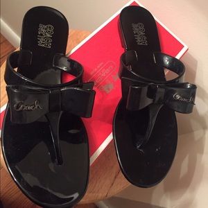 Pretty Jelly Coach Flip Flops