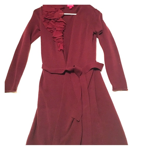 Wrap sweater with side ruffles