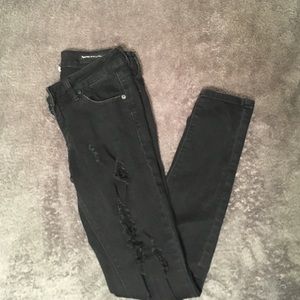 ripped black ankle skinny jeans