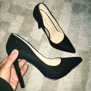 brand new, never worn, black stilettos.