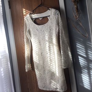 White, open back dress, long sleeve