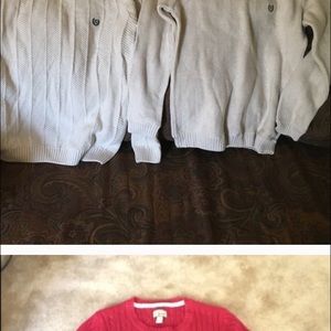 Five sweaters