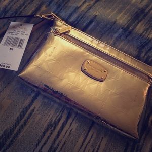MK gold wristlet