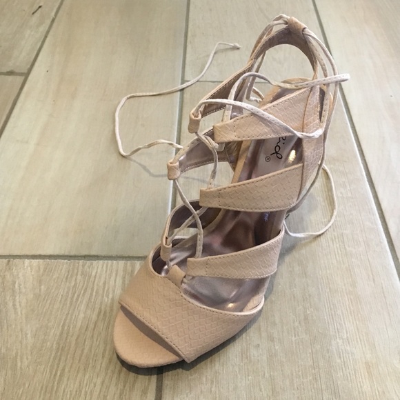 Blush/nude lace up pumps