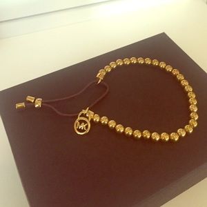 Michael Kors gold toned beaded bracelet