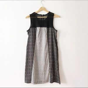 Minimalist Sleeveless Dress with Lace Detailing