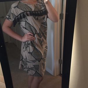 Tan and black t-shirt dress size XS.