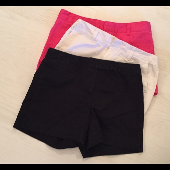 Three pair of khaki shorts