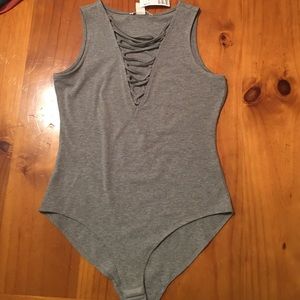 Brand new lace-up bodysuit