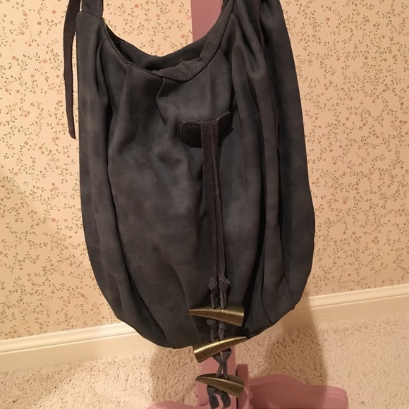 Gray hobo bag with spike detail