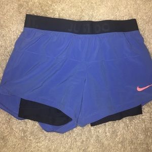 Blue Nike shorts