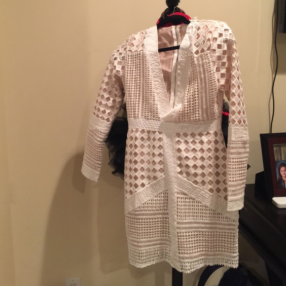 Beautiful white detailed body con dress