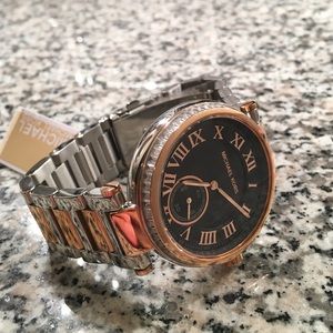 Brand new Michael Kor's silver and rose gold watch