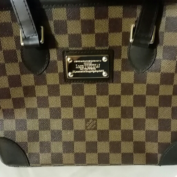 Louis Vuitton - Picture 1 of 3