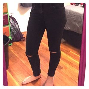 Black skinny jeans with holes