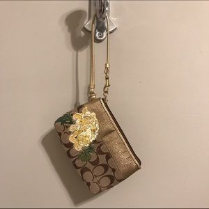 Coach floral wristlet