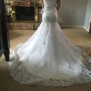 Lace wedding gown. New with tags