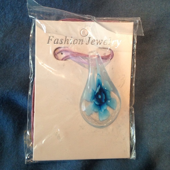 Glass blown blue flower pendant necklace