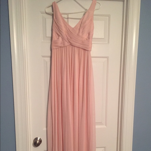 David's Bridal bridesmaid gown in petal pink.