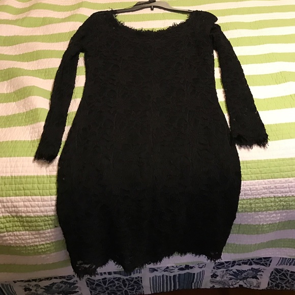 A black, long sleeved dress