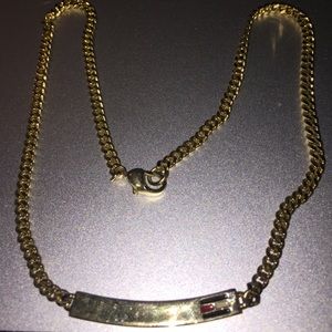 Authentic TH gold necklace