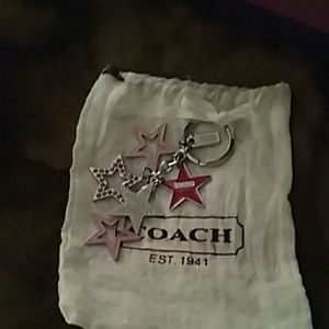 Coach colored stars keychain end and silver stars.