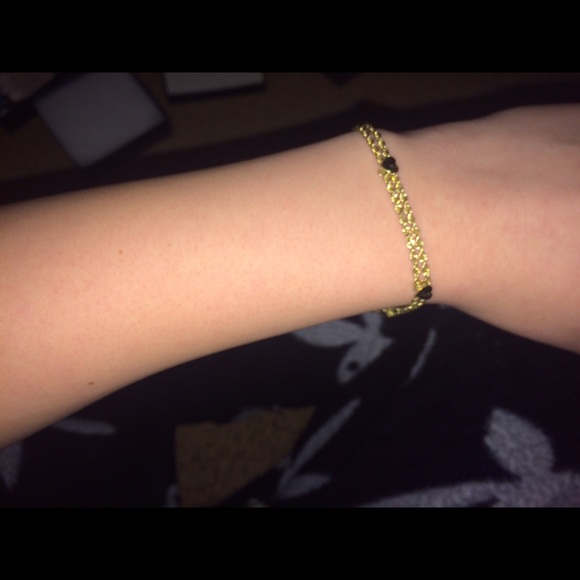Gold bracelet W/ detailed hearts