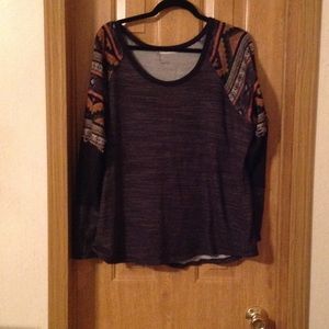 Grey sweater with tribal print on sleeves