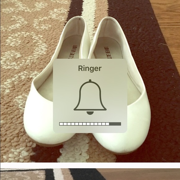 White faux leather flats