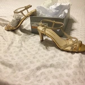 Size 7 1/2, 2 inch gold open toed shoes