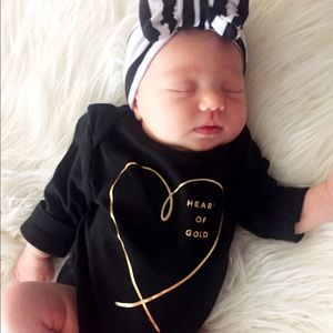 Old navy onesie 0-3 months black and gold