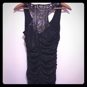 Black leather dress with gun metal detail on back
