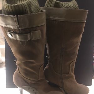 Green boots with sock on top