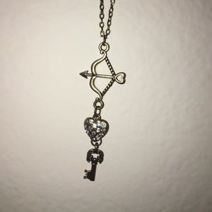 key, heart, and arrow necklace
