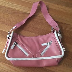 Small pink and white bowling bag style purse.