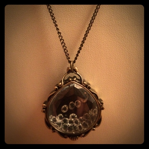 Fun little necklace! Chain is about 16 inches long