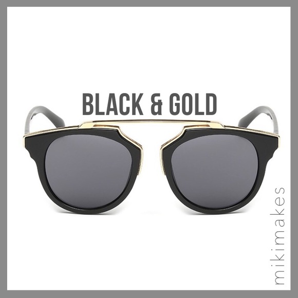 Black frame sunglasses with top gold detail