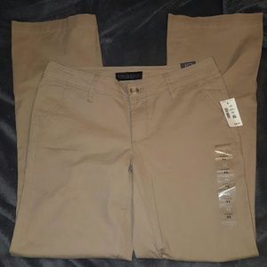 Tan uniform style pants.