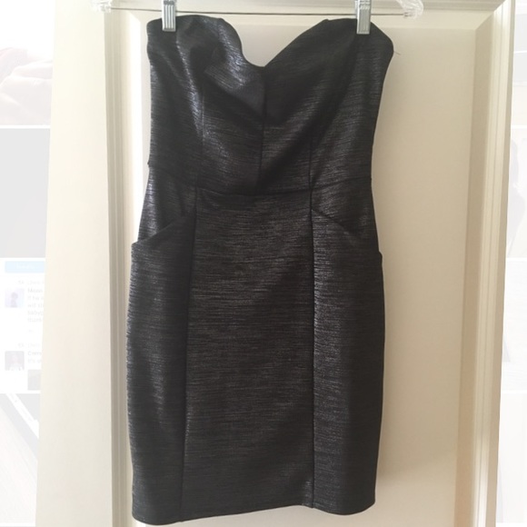 Bodycon black dress with silver accents - Picture 1 of 3