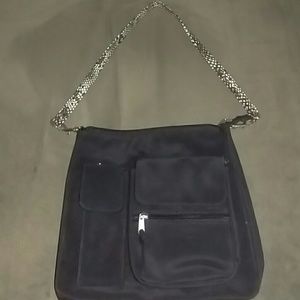 NWOT**Black, lots of pockets, extra strap, purse