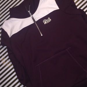 Maroon Vs Pink quarter zip jacket.