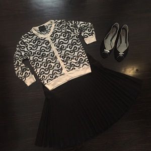 Cropped black and cream cardigan with bow print