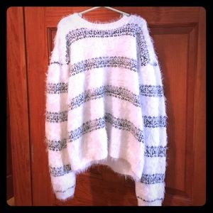Fun fuzzy sweater. Not itchy! Super soft and plush