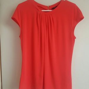 Melon colored Worthington blouse, gold zipper