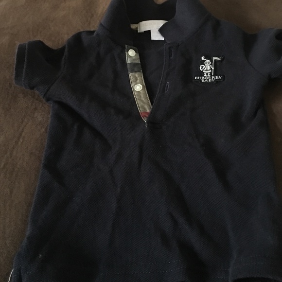 Burberry Children's Navy Blue polo size 9 months.