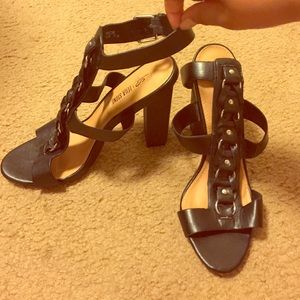 Strappy heels with ankle buckle.